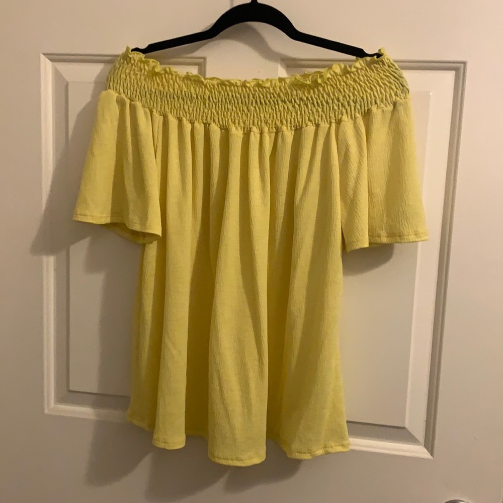 Off the shoulders shirt.